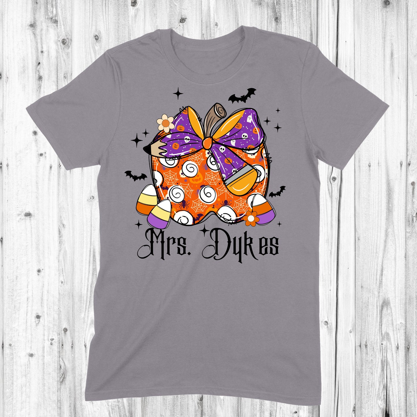 Pumpkin with purple Halloween Bow and Candy Corn