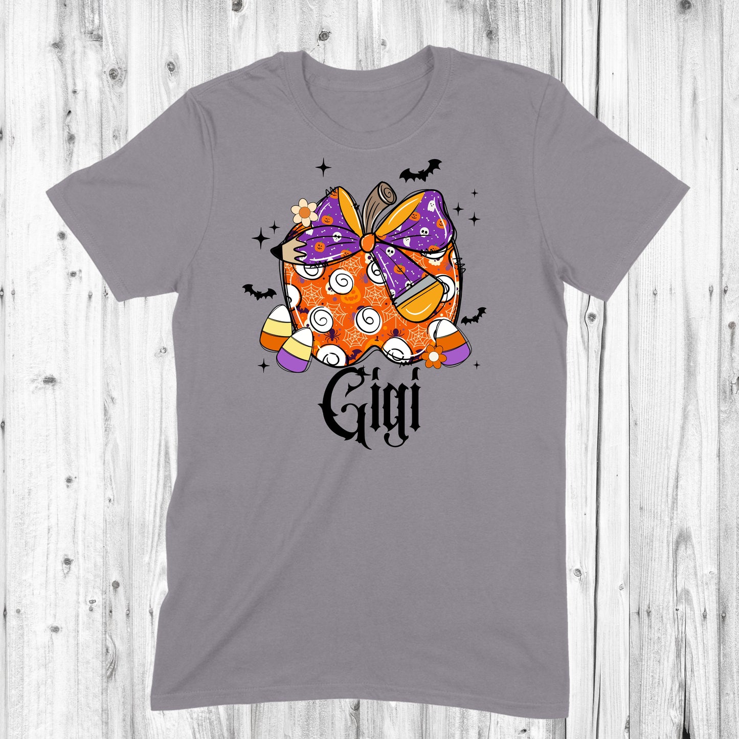 Pumpkin with purple Halloween Bow and Candy Corn