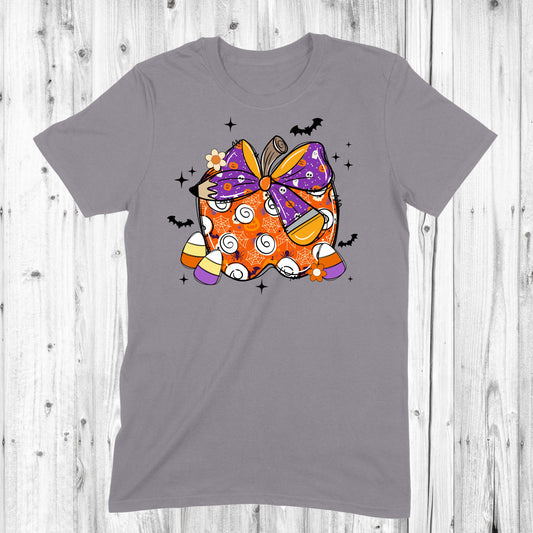 Pumpkin with purple Halloween Bow and Candy Corn